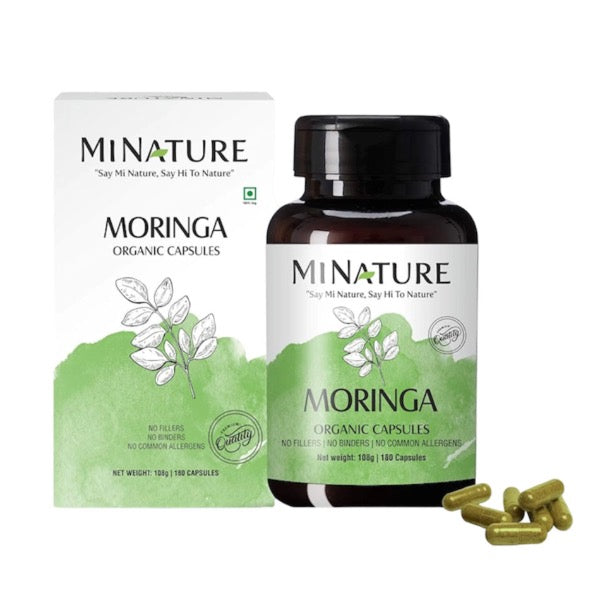 Minature Moringa Capsules in black bottle